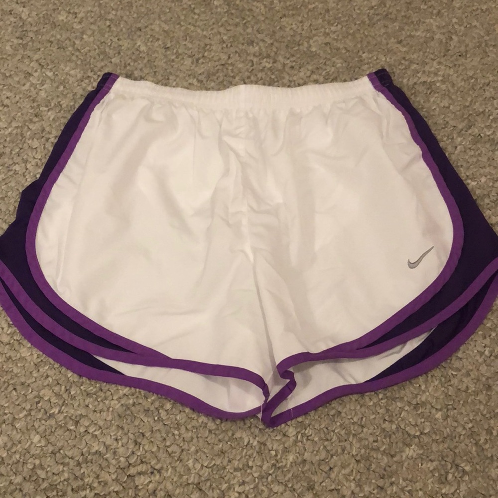 white and purple nike shorts